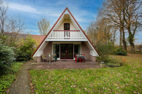Heggenmus I Huisje met Haard in de Tuin